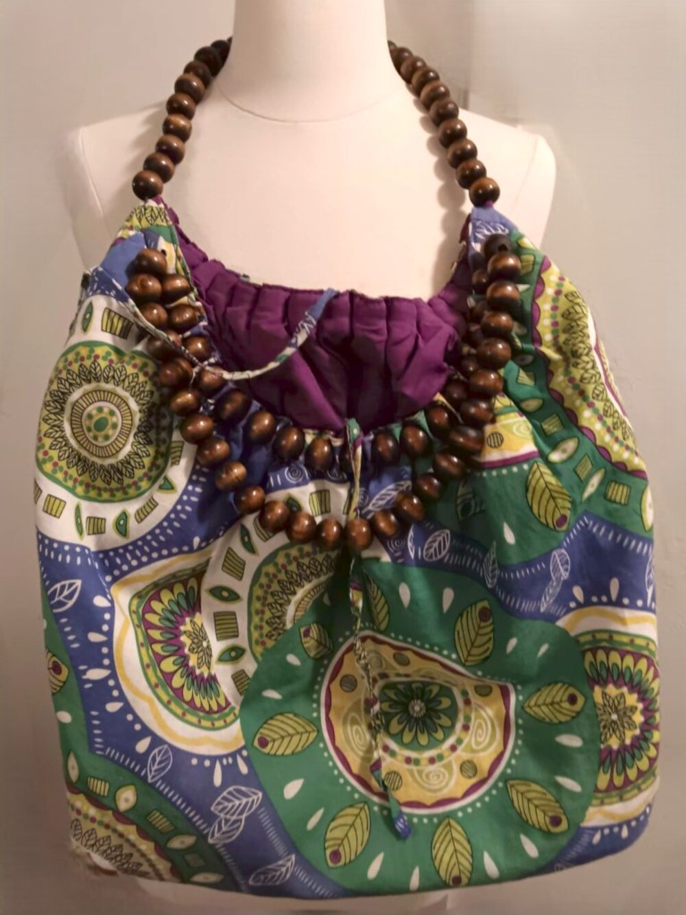 Slouchy boho tote, 100% cotton with wood bead handles.